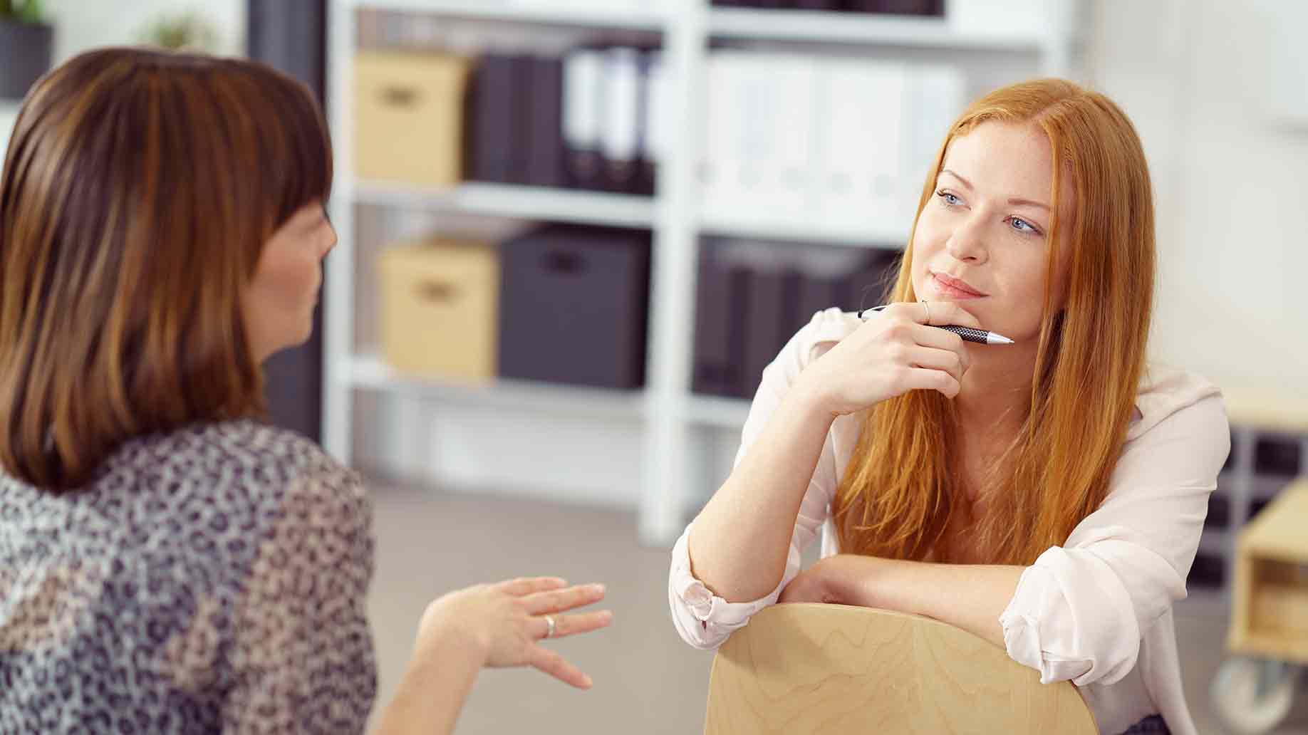 two businesswoman having informal meeting