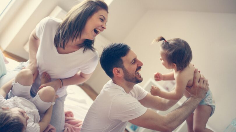 Family Playing Rough Housing Joy Laughter