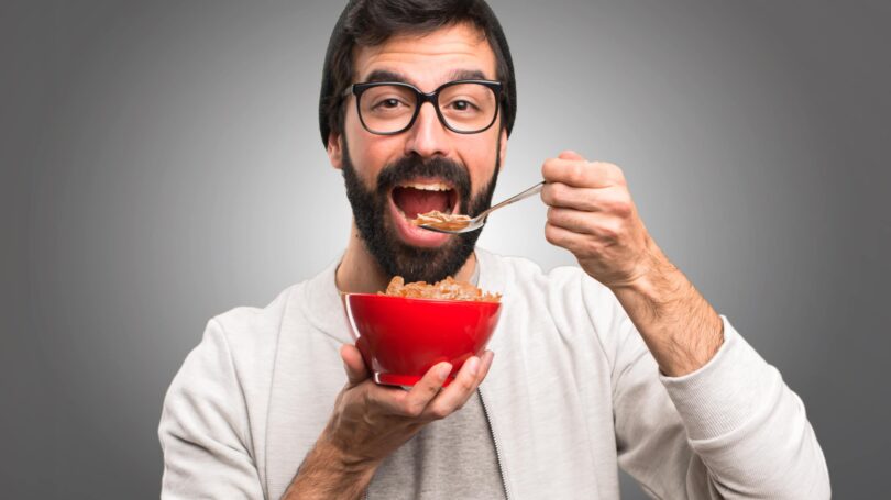 Adult Man Eating Cereal Bowl