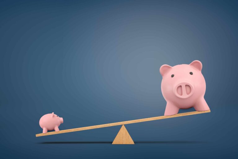 Rendering Of Two Piggy Banks On Seesaw Comparing