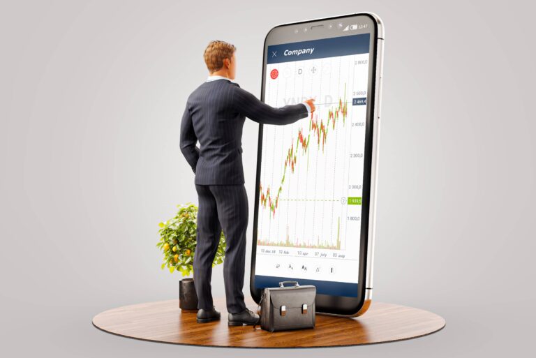 Businessman Standing In Front Of Phone Investing App Stock