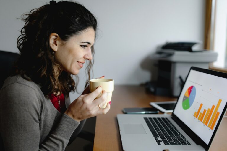 Woman Checking Finances On Computer